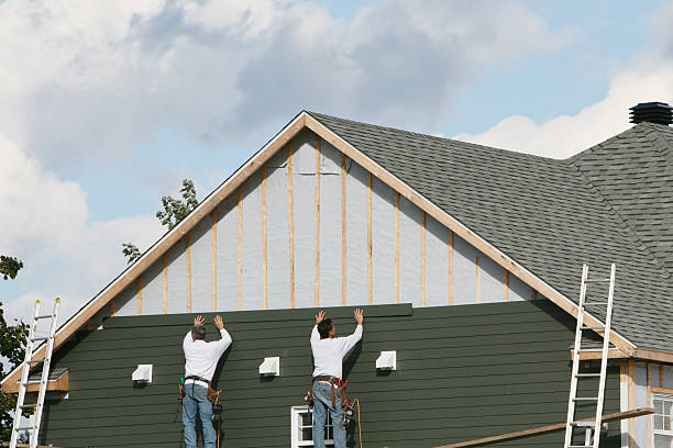 Professional Siding technician working in Highwood, IL